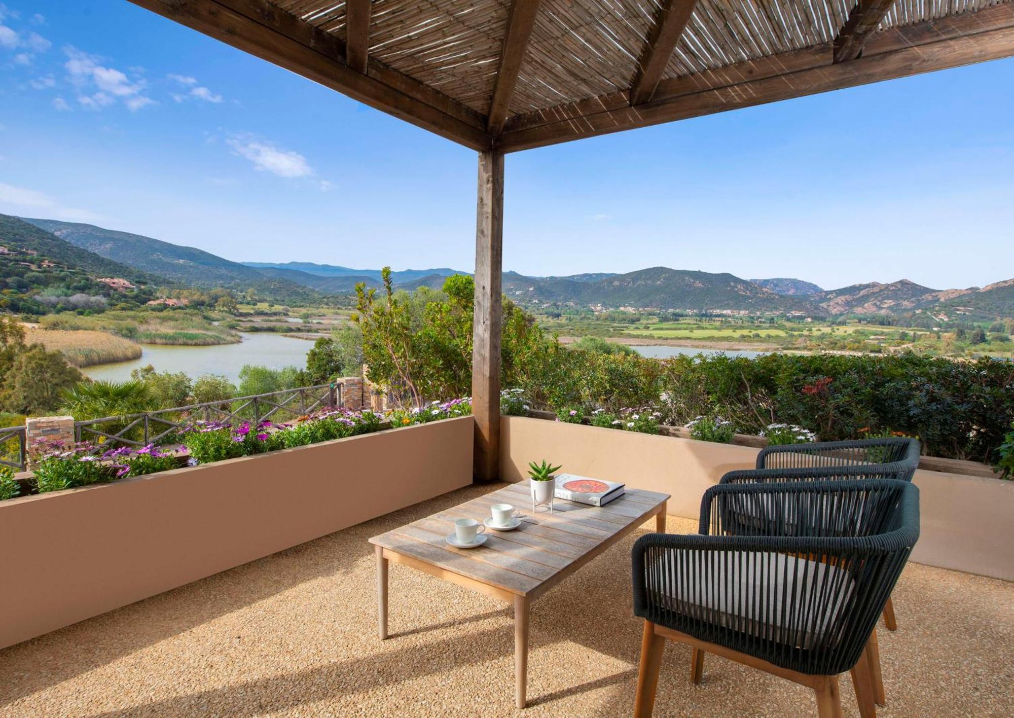 Baia Di Chia Resort Sardinia, Curio Collection By Hilton Екстер'єр фото