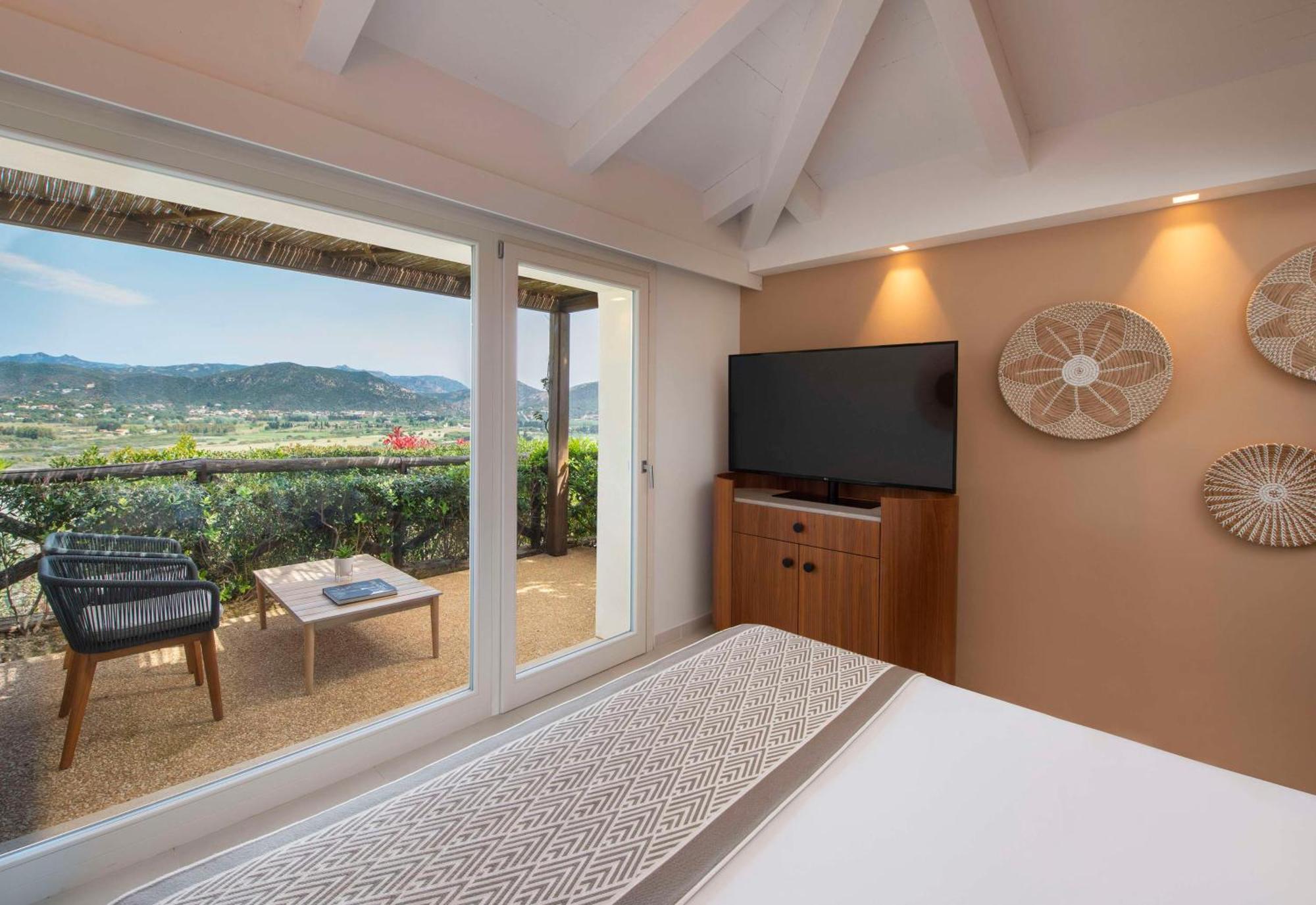 Baia Di Chia Resort Sardinia, Curio Collection By Hilton Екстер'єр фото